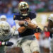 Oct 19, 2024; Atlanta, Georgia, USA; Notre Dame Fighting Irish quarterback Riley Leonard (13) runs the ball for a touchdown against the Georgia Tech Yellow Jackets in the second quarter at Mercedes-Benz Stadium. Mandatory Credit: Brett Davis-Imagn Images