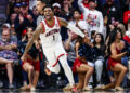 Dec 30, 2024; Tucson, Arizona, USA; Arizona Wildcats guard Caleb Love (1) celebrates his dunk during the first half of the game against the TCU Horned Frogs at McKale Center. Mandatory Credit: Aryanna Frank-Imagn Images