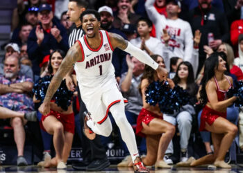 Dec 30, 2024; Tucson, Arizona, USA; Arizona Wildcats guard Caleb Love (1) celebrates his dunk during the first half of the game against the TCU Horned Frogs at McKale Center. Mandatory Credit: Aryanna Frank-Imagn Images