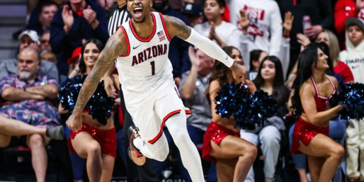 Dec 30, 2024; Tucson, Arizona, USA; Arizona Wildcats guard Caleb Love (1) celebrates his dunk during the first half of the game against the TCU Horned Frogs at McKale Center. Mandatory Credit: Aryanna Frank-Imagn Images