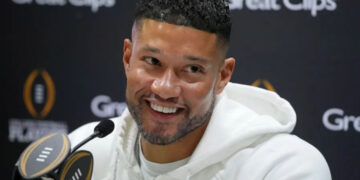 Jan 18, 2025; Atlanta, GA, USA; Notre Dame Fighting Irish head coach Marcus Freeman talks to the media during 2025 CFP National Championship Media Day at Georgia World Congress Center, Building A. Mandatory Credit: Kirby Lee-Imagn Images