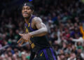 Feb 1, 2024; Boston, Massachusetts, USA; Los Angeles Lakers forward Jarred Vanderbilt (2) reacts after his three point basket against the Boston Celtics in the second quarter at TD Garden. Mandatory Credit: David Butler II-Imagn Images