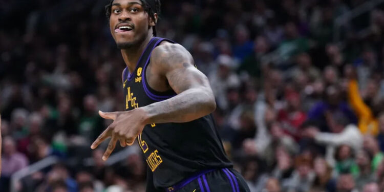 Feb 1, 2024; Boston, Massachusetts, USA; Los Angeles Lakers forward Jarred Vanderbilt (2) reacts after his three point basket against the Boston Celtics in the second quarter at TD Garden. Mandatory Credit: David Butler II-Imagn Images