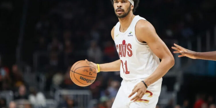 Mar 6, 2024; Atlanta, Georgia, USA; Cleveland Cavaliers center Jarrett Allen (31) handles the ball against the Atlanta Hawks in the first quarter at State Farm Arena. credits: Brett Davis-USA TODAY Sports