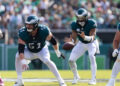 Oct 13, 2024; Philadelphia, Pennsylvania, USA; Philadelphia Eagles center Cam Jurgens (51) snaps the ball to quarterback Jalen Hurts (1) in a game against the Cleveland Browns at Lincoln Financial Field. Mandatory Credit: Bill Streicher-Imagn Images