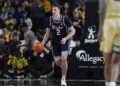 Jan 25, 2025; Winston-Salem, North Carolina, USA; Duke Blue Devils guard Cooper Flagg (2) brings the ball up court against the Wake Forest Demon Deacons during the second half at Lawrence Joel Veterans Memorial Coliseum. Mandatory Credit: Jim Dedmon-Imagn Images