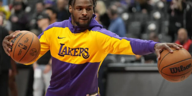 Nov 1, 2024; Toronto, Ontario, CAN; Los Angeles Lakers guard Bronny James (9) during warm-up before a game against the Toronto Raptors at Scotiabank Arena. Mandatory Credit: John E. Sokolowski-Imagn Images