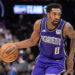 Jan 19, 2025; Sacramento, California, USA; Sacramento Kings guard Malik Monk (0) controls the ball against the Washington Wizards during the third quarter at Golden 1 Center. Mandatory Credit: Ed Szczepanski-Imagn Images