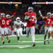 ARLINGTON, TEXAS - JANUARY 10: Jack Sawyer #33 of the Ohio State Buckeyes runs with the ball after recovering a fumble in the fourth quarter against the Texas Longhorns during the Goodyear Cotton Bowl at AT&T Stadium on January 10, 2025 in Arlington, Texas. (Photo by Alex Slitz/Getty Images)