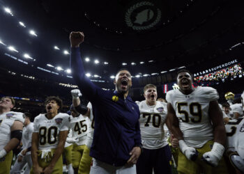 NEW ORLEANS, LOUISIANA - JANUARY 02: Head coach Marcus Freeman of the Notre Dame Fighting Irish celebrates with his team after a 23-10 victory against the Georgia Bulldogs in the 91st Allstate Sugar Bowl at Caesars Superdome on January 02, 2025 in New Orleans, Louisiana. (Photo by Sean Gardner/Getty Images)