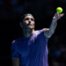 Jan 14, 2025; Melbourne, Victoria, Australia; Taylor Fritz of United States of America serves during his match against Jenson Brooksby of United States of America in the first round of the men's singles at the 2025 Australian Open at Melbourne Park. Mandatory Credit: Mike Frey-Imagn Images