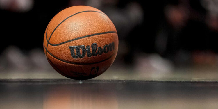 DETROIT, MICHIGAN - JANUARY 09: A detailed view of a Wilson brand official game ball with the NBA logo on the basketball court during the game between the Detroit Pistons and Golden State Warriors at Little Caesars Arena on January 09, 2025 in Detroit, Michigan. NOTE TO USER: User expressly acknowledges and agrees that, by downloading and or using this photograph, User is consenting to the terms and conditions of the Getty Images License Agreement. (Photo by Nic Antaya/Getty Images)