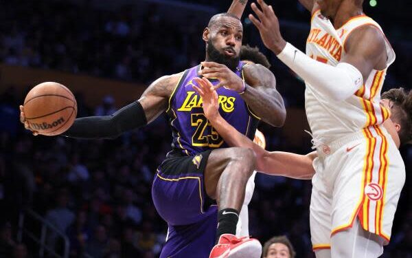 Los Angeles, California January 3, 2025-Lakers LeBron James gets a pass off against the Hawks defense.