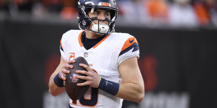 CINCINNATI, OH - DECEMBER 28: Denver Broncos Quarterback Bo Nix (10) warms up before the NFL football game between the Denver Broncos and the Cincinnati Bengals on December 28, 2024, at Paycor Stadium in Cincinnati, Ohio. (Photo by Michael Allio/Icon Sportswire via Getty Images)