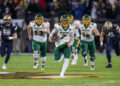 FRISCO, TX - JANUARY 06: North Dakota State Bison quarterback Cam Miller (7) breaks through the line during the FCS Championship game between North Dakota State and Montana State on January 6, 2025 at Toyota Stadium in Frisco, TX. (Photo by George Walker/Icon Sportswire via Getty Images)