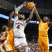 Jan 25, 2025; Auburn, Alabama, USA;  Auburn Tigers forward Johni Broome (4) shoots the ball against Tennessee Volunteers guard Jahmai Mashack (15) during the second half at Neville Arena. Mandatory Credit: John Reed-Imagn Images