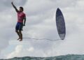 The third day of the surfing Olympic event in French Polynesia at Teahupo’o, Brazilian surfer Gabriel Medina gets the biggest wave of the competition and celebrates in a unique position by thanking God. July 29, 2024