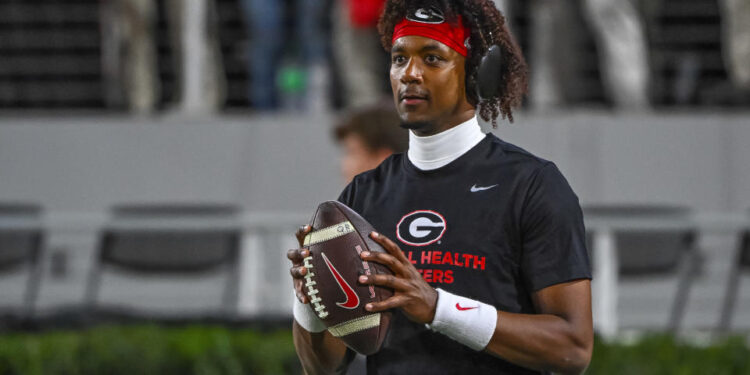 ATHENS, GA - NOVEMBER 16: Georgia Bulldogs quarterback Jaden Rashada (10) prior to the college football game between the Tennessee Volunteers and the Georgia Bulldogs on November 16, 2024, on Dooley Field at Sanford Stadium in Athens, GA. (Photo by John Adams/Icon Sportswire via Getty Images)