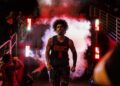 USC forward Saint Thomas exits a tunnel of smoke and steps on the Galen Center before a game against Oregon