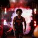 USC forward Saint Thomas exits a tunnel of smoke and steps on the Galen Center before a game against Oregon