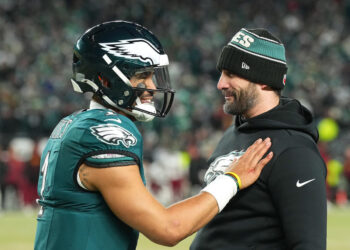 PHILADELPHIA, PENNSYLVANIA - JANUARY 26: Jalen Hurts #1 of the Philadelphia Eagles celebrates with head coach Nick Sirianni after their 55-23 win over the Washington Commanders during the NFC Championship Game at Lincoln Financial Field on January 26, 2025 in Philadelphia, Pennsylvania.  (Photo by Mitchell Leff/Getty Images)