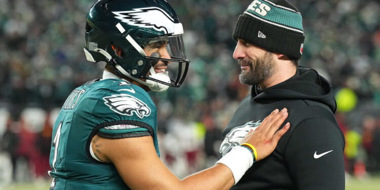 PHILADELPHIA, PENNSYLVANIA - JANUARY 26: Jalen Hurts #1 of the Philadelphia Eagles celebrates with head coach Nick Sirianni after their 55-23 win over the Washington Commanders during the NFC Championship Game at Lincoln Financial Field on January 26, 2025 in Philadelphia, Pennsylvania.  (Photo by Mitchell Leff/Getty Images)