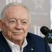 Jerry Jones talks to reporters