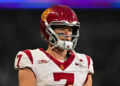 SEATTLE, WASHINGTON - NOVEMBER 02: Miller Moss #7 of the USC Trojans looks on during the second quarter of the game against the Washington Huskies at Husky Stadium on November 02, 2024 in Seattle, Washington. (Photo by Alika Jenner/Getty Images)