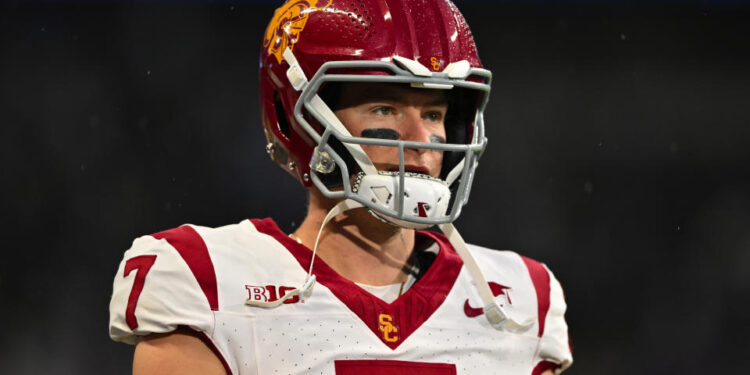 SEATTLE, WASHINGTON - NOVEMBER 02: Miller Moss #7 of the USC Trojans looks on during the second quarter of the game against the Washington Huskies at Husky Stadium on November 02, 2024 in Seattle, Washington. (Photo by Alika Jenner/Getty Images)