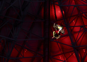 ATLANTA, GEORGIA - OCTOBER 3: Mascot Freddie Falcon of the Atlanta Falcons hangs from the catwalk prior to an NFL football game between the Atlanta Falcons and the Tampa Bay Buccaneers at Mercedes-Benz Stadium on October 3, 2024 in Atlanta, Georgia. (Photo by Kevin Sabitus/Getty Images)