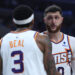 LOS ANGELES, CALIFORNIA - APRIL 10: Jusuf Nurkic #20 of the Phoenix Suns talks with Bradley Beal #3 during a 124-108 win over the LA Clippers at Crypto.com Arena on April 10, 2024 in Los Angeles, California. User is consenting to the terms and conditions of the Getty Images License Agreement.  (Photo by Harry How/Getty Images)