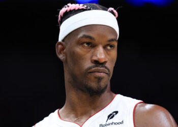 MIAMI, FLORIDA - JANUARY 01: Jimmy Butler #22 of the Miami Heat looks on against the New Orleans Pelicans during the second quarter of the game at Kaseya Center on January 01, 2025 in Miami, Florida. NOTE TO USER: User expressly acknowledges and agrees that, by downloading and or using this photograph, User is consenting to the terms and conditions of the Getty Images License Agreement. (Photo by Megan Briggs/Getty Images)