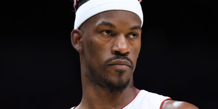 MIAMI, FLORIDA - JANUARY 01: Jimmy Butler #22 of the Miami Heat looks on against the New Orleans Pelicans during the second quarter of the game at Kaseya Center on January 01, 2025 in Miami, Florida. NOTE TO USER: User expressly acknowledges and agrees that, by downloading and or using this photograph, User is consenting to the terms and conditions of the Getty Images License Agreement. (Photo by Megan Briggs/Getty Images)