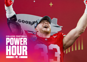 Jack Sawyer of the Ohio State Buckeyes celebrates during the trophy ceremony after beating the Texas Longhorns 28-14 to win the Goodyear Cotton Bowl. (Photo by Ron Jenkins/Getty Images)