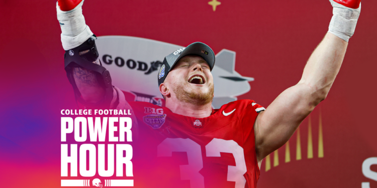 Jack Sawyer of the Ohio State Buckeyes celebrates during the trophy ceremony after beating the Texas Longhorns 28-14 to win the Goodyear Cotton Bowl. (Photo by Ron Jenkins/Getty Images)