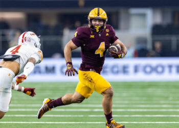 ARLINGTON, TX - DECEMBER 07: Arizona State Sun Devils running back Cam Skattebo (#4) runs up field during the Big 12 championship football game between the Arizona State Sun Devils and the Iowa State Cyclones on December 7, 2024 at AT&T Stadium in Arlington, TX.  (Photo by Matthew Visinsky/Icon Sportswire via Getty Images)