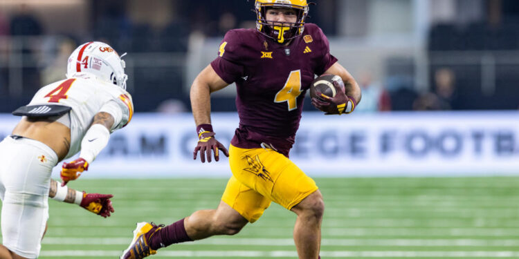 ARLINGTON, TX - DECEMBER 07: Arizona State Sun Devils running back Cam Skattebo (#4) runs up field during the Big 12 championship football game between the Arizona State Sun Devils and the Iowa State Cyclones on December 7, 2024 at AT&T Stadium in Arlington, TX.  (Photo by Matthew Visinsky/Icon Sportswire via Getty Images)