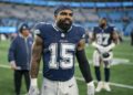 Dallas Cowboys running back Ezekiel Elliott (15) walks off the field after an NFL football game.