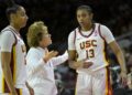 Southern California associate head coach Beth Burns talks with Southern California center Rayah Marshall (13) as Southern California guard JuJu Watkins, left, looks on during an NCAA college basketball game against Penn State, Sunday, Jan. 12, 2025, in Los Angeles. (AP Photo/Jayne Kamin-Oncea)