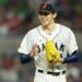 Roki Sasaki smiles while pitching for Japan in the World Baseball Classic in March 2023.