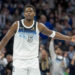 Jan 2, 2025; Minneapolis, Minnesota, USA; Minnesota Timberwolves guard Anthony Edwards (5) celebrates after making a three point shot against the Boston Celtics in the second half at Target Center. Mandatory Credit: Jesse Johnson-Imagn Images