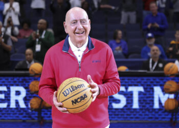 TAMPA, FL - MARCH 12: College basketball legend Dick Vitale is featuring before the SEC Tournament between the Texas A&M Aggies and the Arkansas Razorbacks on Thursday, March 11, 2022 at the Amalie Arena in Tampa, FL (Photo by Peter Joneleit/Icon Sportswire via Getty Images)