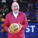 TAMPA, FL - MARCH 12: College basketball legend Dick Vitale is featuring before the SEC Tournament between the Texas A&M Aggies and the Arkansas Razorbacks on Thursday, March 11, 2022 at the Amalie Arena in Tampa, FL (Photo by Peter Joneleit/Icon Sportswire via Getty Images)