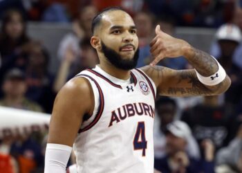 Auburn forward Johni Broome reacts after making a 3-point basket against Missouri during the first half of an NCAA college basketball game, Saturday, Jan. 4, 2025, in Auburn, Ala. (AP Photo/Butch Dill)