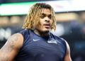 SEATTLE, WASHINGTON - NOVEMBER 24: Byron Murphy II #91 of the Seattle Seahawks looks on after a game against the Arizona Cardinals at Lumen Field on November 24, 2024 in Seattle, Washington. (Photo by Rio Giancarlo/Getty Images)