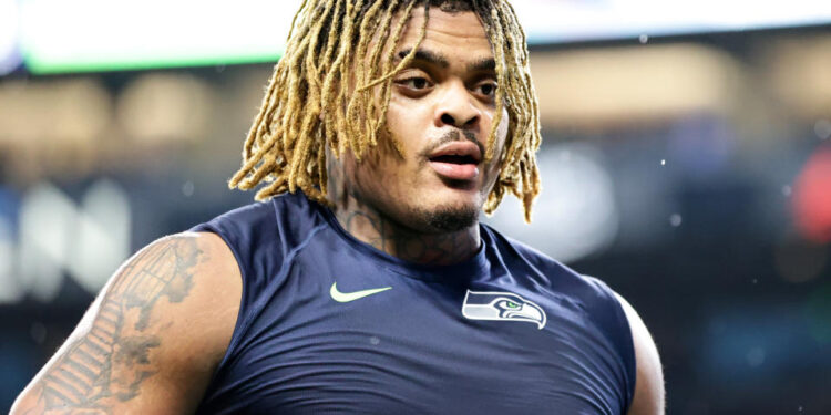 SEATTLE, WASHINGTON - NOVEMBER 24: Byron Murphy II #91 of the Seattle Seahawks looks on after a game against the Arizona Cardinals at Lumen Field on November 24, 2024 in Seattle, Washington. (Photo by Rio Giancarlo/Getty Images)