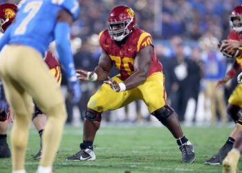 PASADENA, CALIFORNIA - NOVEMBER 23: Emmanuel Pregnon #70 of the USC Trojans.