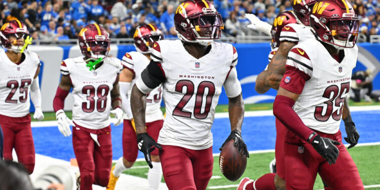 Washington's defense celebrates one of its five takeaways against the Lions. (Steven King/Icon Sportswire via Getty Images)