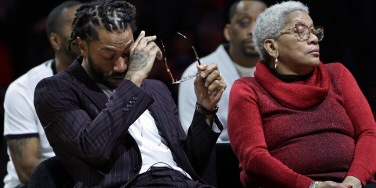 CHICAGO, ILLINOIS - JANUARY 04: Former Chicago Bulls star Derrick Rose becomes emotional during a half-time celebration for Derrick Rose Night at the United Center on January 4, 2025 in Chicago, Illinois. NOTE TO USER: User expressly acknowledges and agrees that, by downloading and or using this photograph, User is consenting to the terms and conditions of the Getty Images License Agreement. (Photo by Geoff Stellfox/Getty Images)