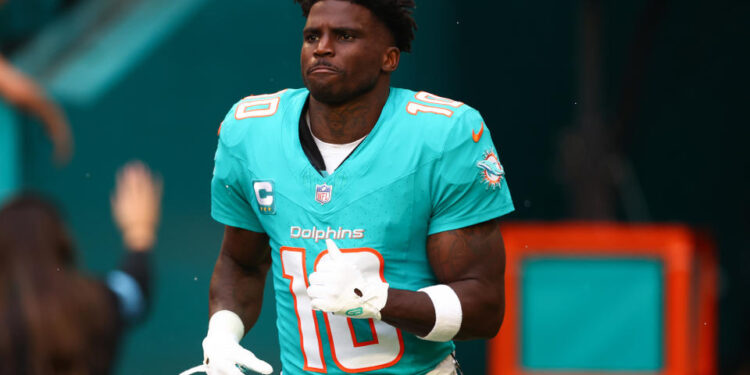 MIAMI GARDENS, FLORIDA - DECEMBER 22: Tyreek Hill #10 of the Miami Dolphins takes the field prior to a game against the San Francisco 49ers at Hard Rock Stadium on December 22, 2024 in Miami Gardens, Florida. (Photo by Megan Briggs/Getty Images)